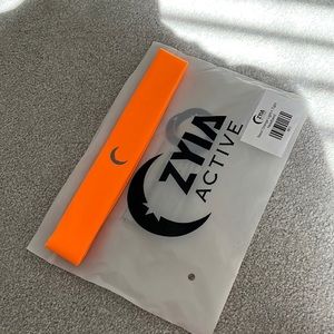 NEW ZYIA Neon orange light and tight headband